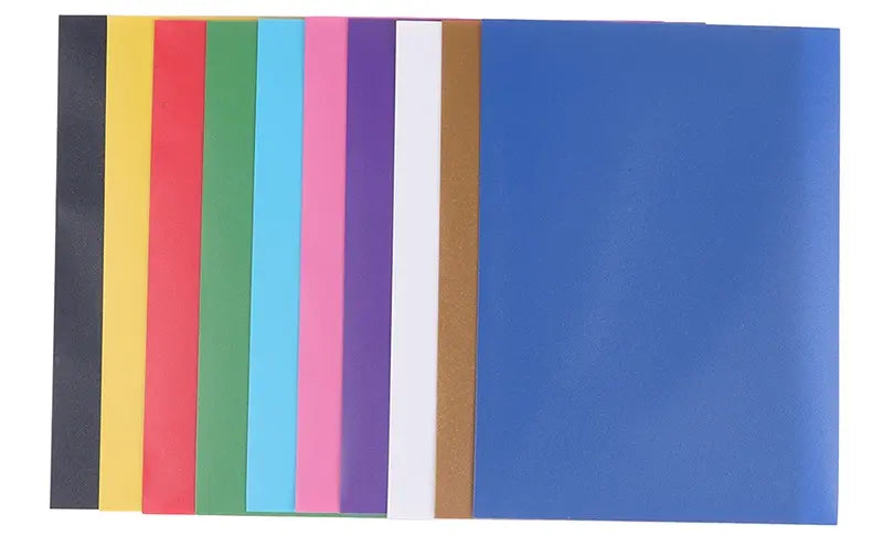 Stack of colorful card sleeves used for trading card games