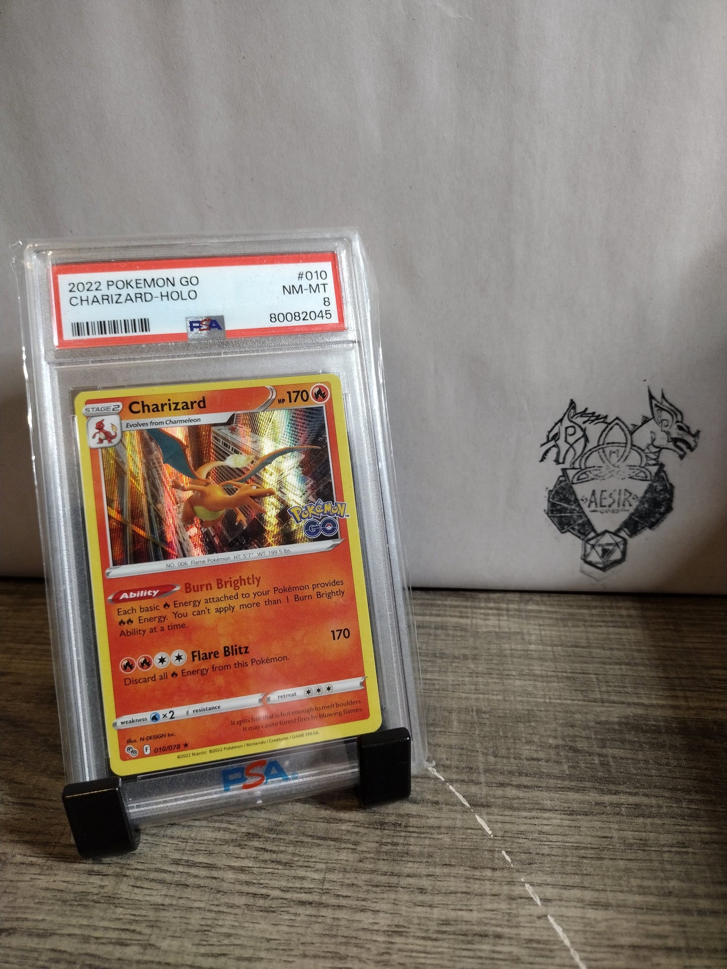 Pokemon go #10 charizard PSA 8