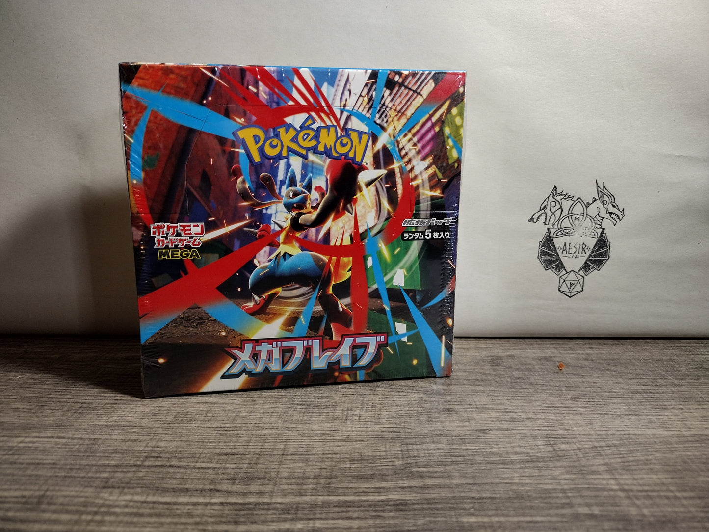 Front view of sealed mega brave Pokémon Booster Box – factory sealed.