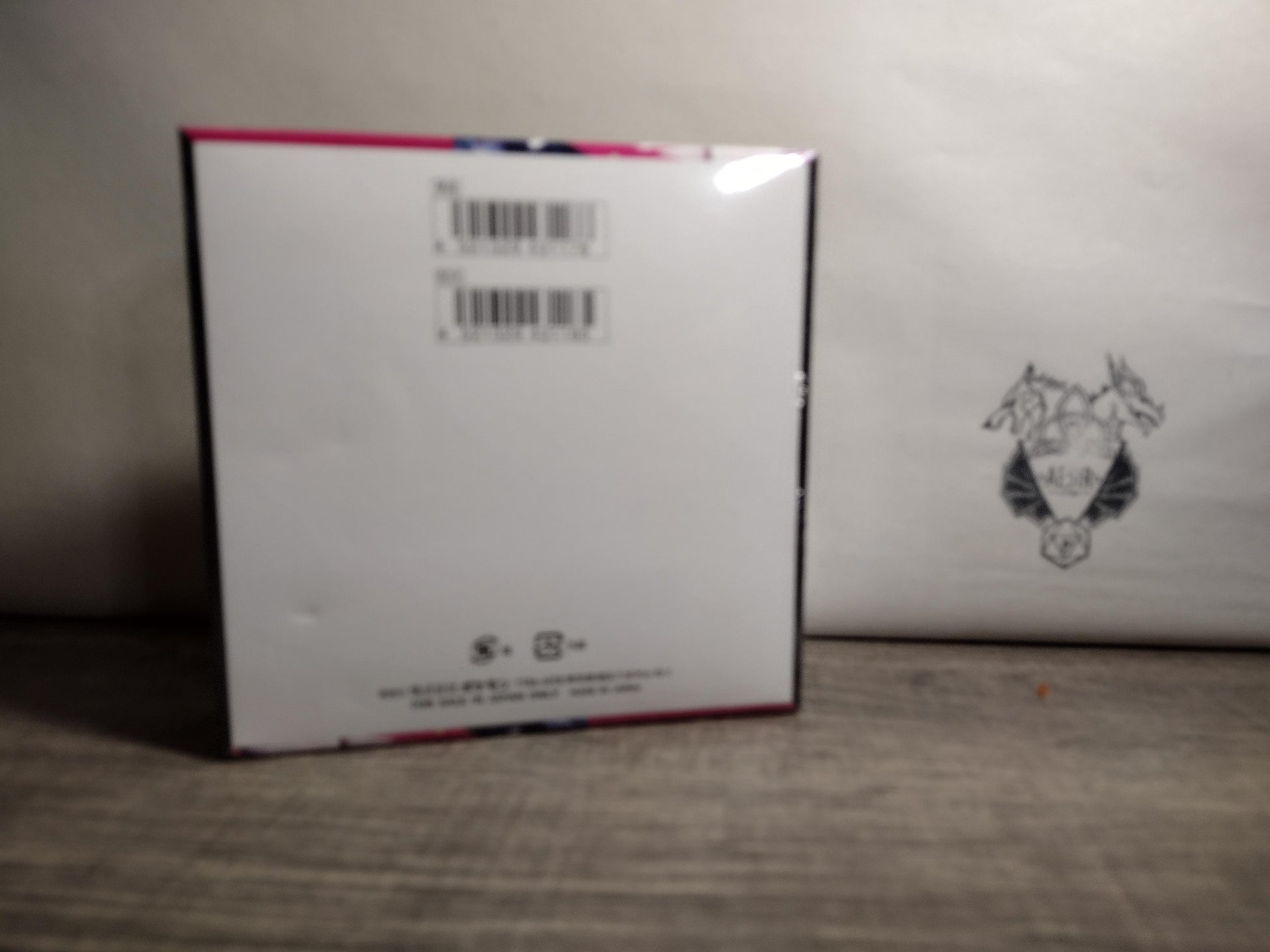 Back view of sealed mega symphonia Pokémon Booster Box – factory sealed.
