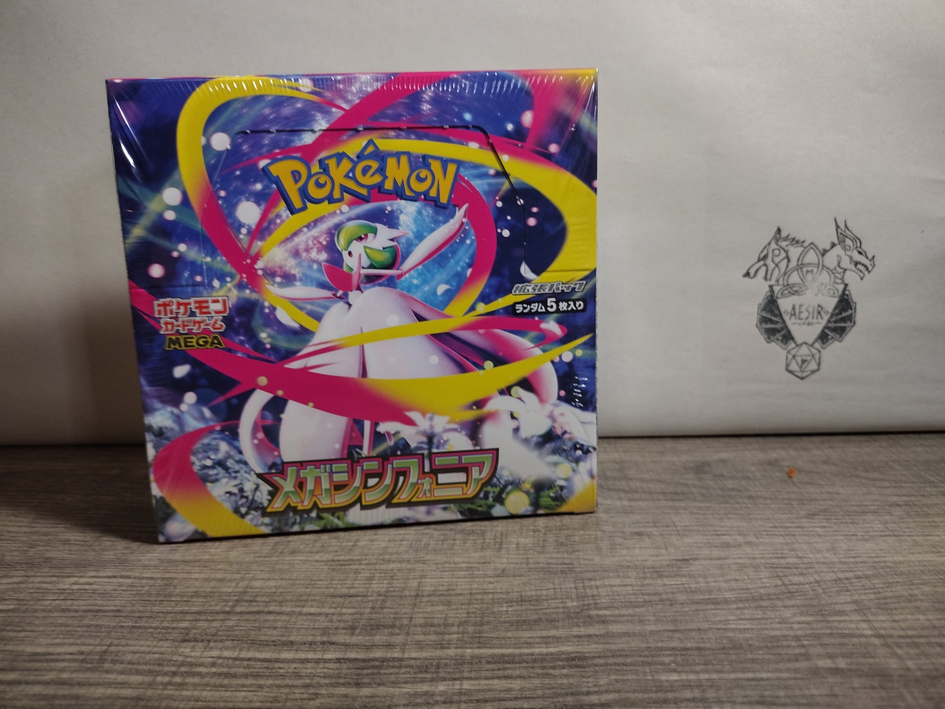 Front view of sealed Pokémon Mega Symphonia Booster Box – factory sealed.